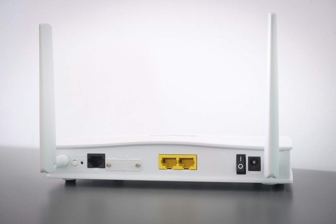 Router-Neustart und Zurücksetzen unterscheiden